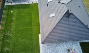 Aerial view residential property renovation - ALTA SURVEY Orlando Aerial view of a residential yard and roofline that shows why a topographic survey is important for understanding land slope during home renovations