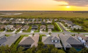 Aerial suburban neighborhood homes - ALTA SURVEY Orlando Aerial view of a suburban neighborhood showing lot layouts and home placement, often reviewed during a property survey before buying