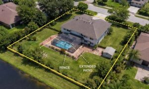 Aerial property boundary unpermitted changes - ALTA SURVEY Orlando Aerial view of a residential property showing boundary lines and site changes verified by a licensed land surveyor