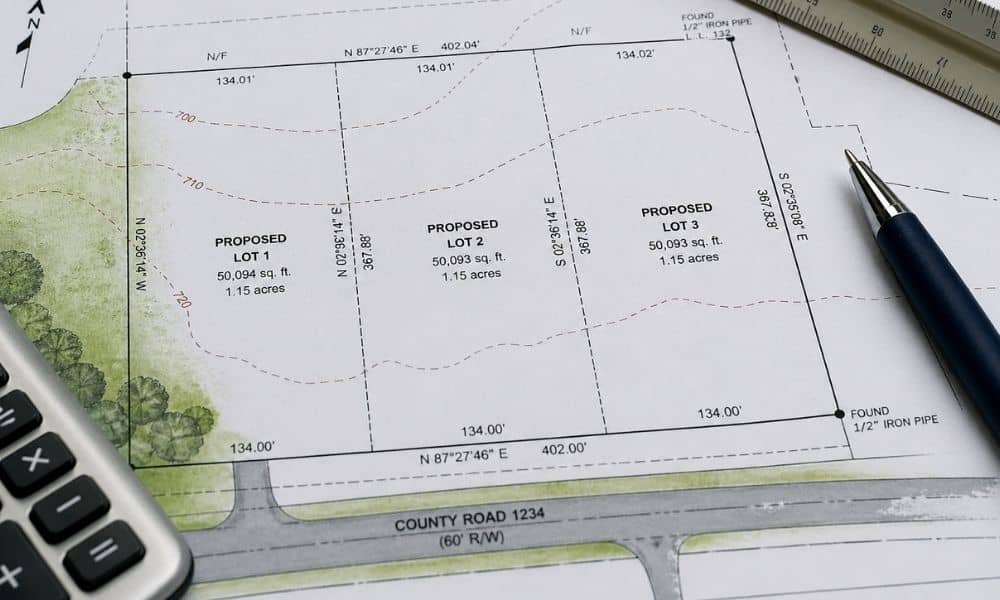 A plat of survey showing property lines and a proposed lot split layout