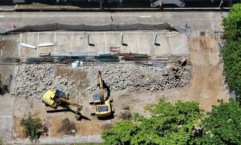 Aerial view of an active construction site where drone surveying can capture detailed site conditions