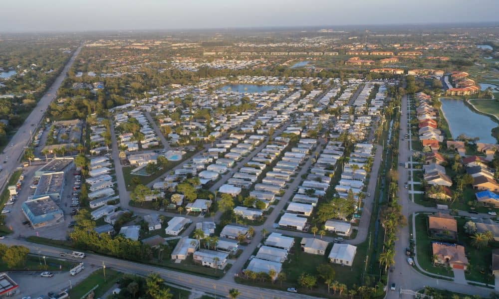Aerial view of a Florida residential community with homes, roads, and waterways, illustrating the property context of an elevation certificate